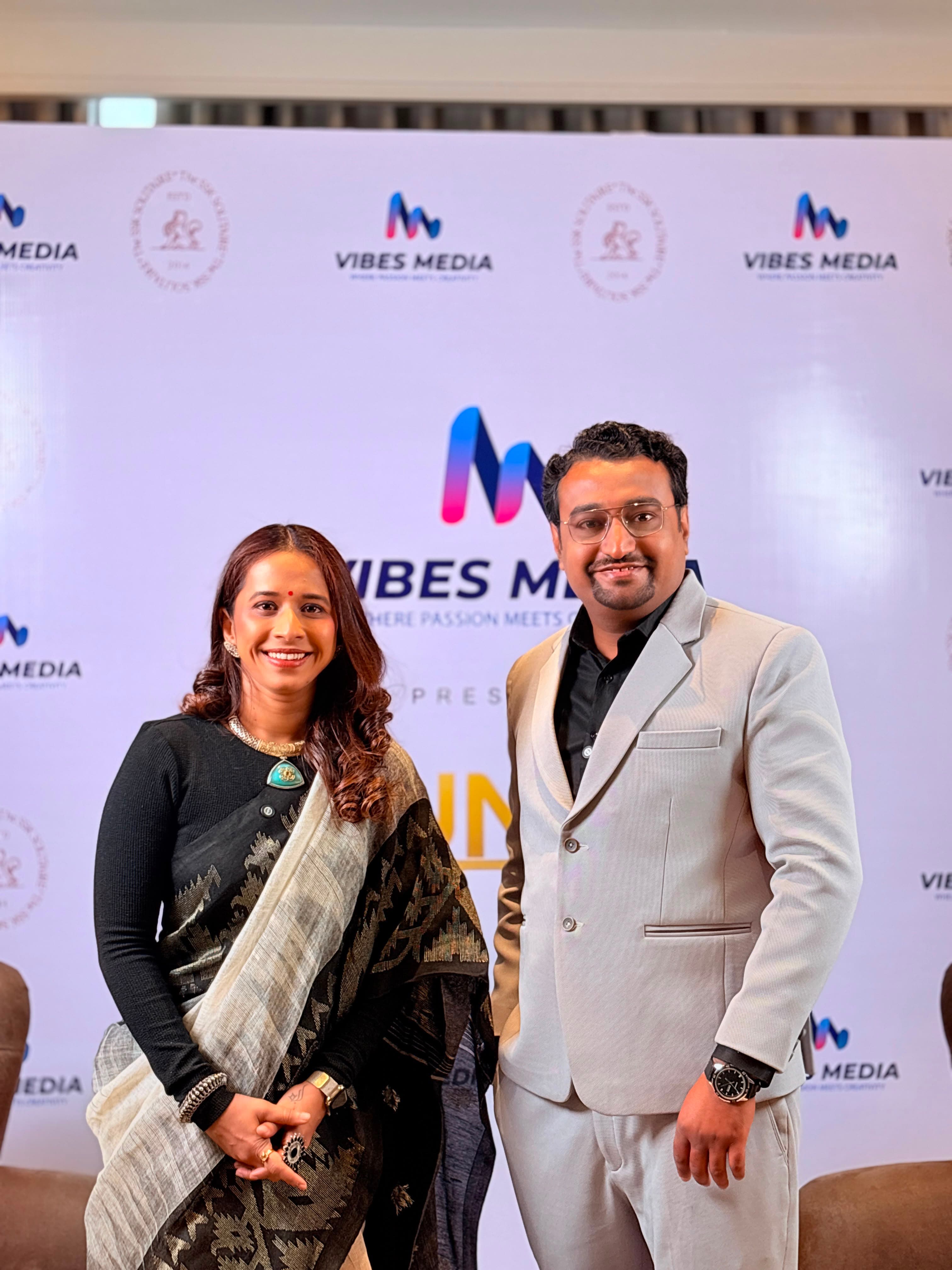 Dr. Gaurav Deore felicitated alongside celebrity host Shreya Bugde at a Vibes Media event