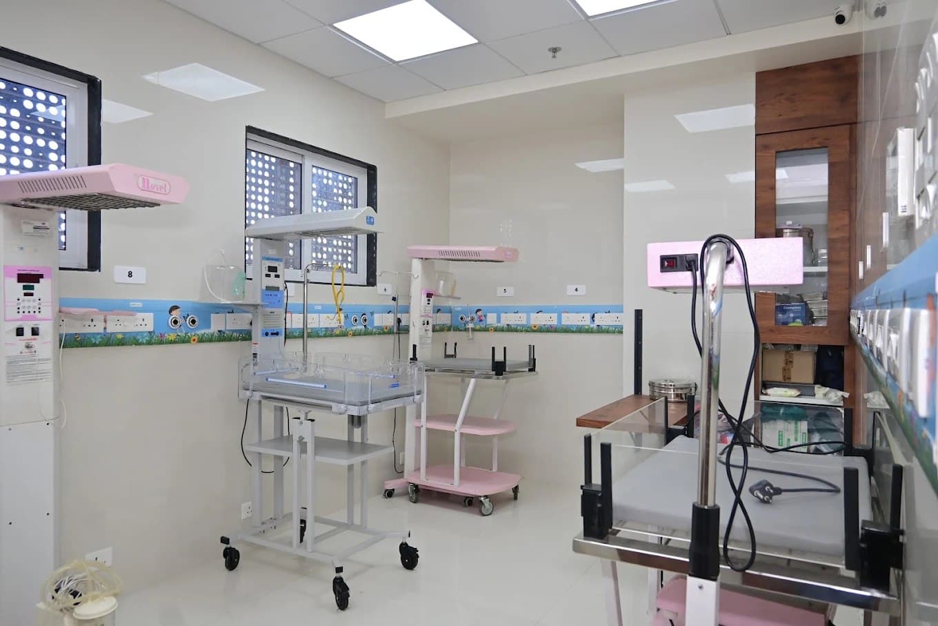 Advanced NICU equipment with phototherapy, warmers, and critical care backup